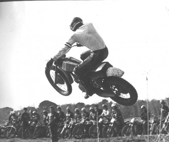 Jaroslav gets some air while the Italian MX team watches